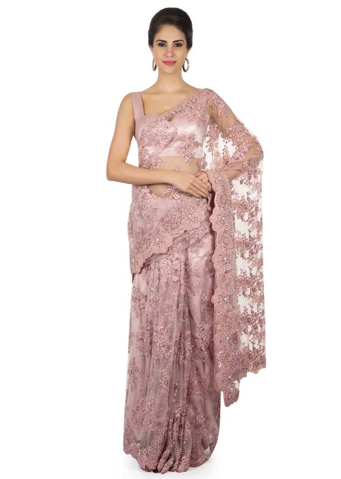 Pink embroidered net saree with scalloped border only on Kalki