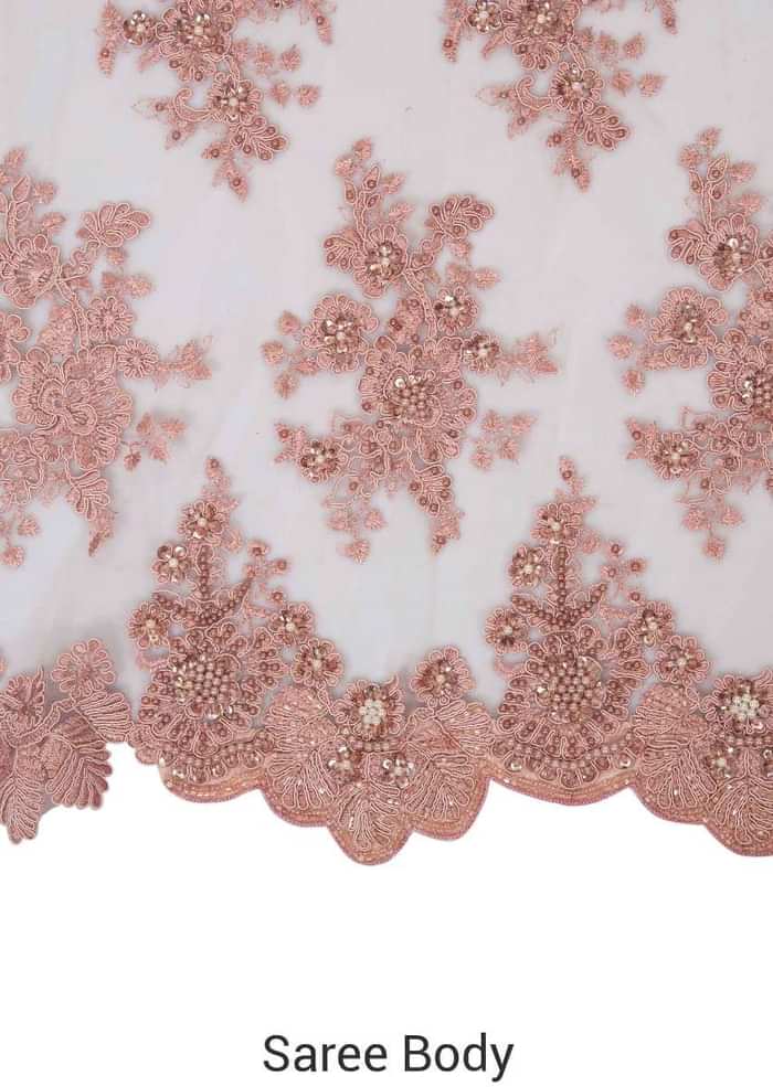 Pink embroidered net saree with scalloped border only on Kalki
