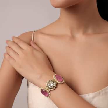 Pink Kundan Studded Bracelet With Carved Stones