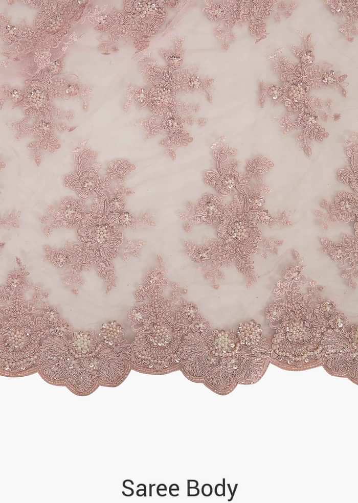 Pink saree in embroidered net encrusted in floral motifs with resham and moti work only on Kalki