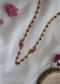 Pink Toned Kundan Necklace Adorned With Peacock Motif