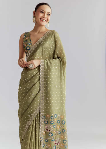 Pista Green Muslin Embroidered Saree With Heavy Hand Embroidery
