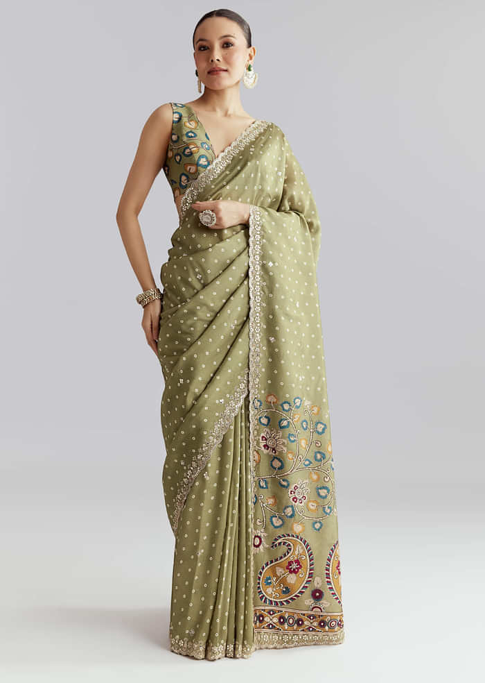 Pista Green Muslin Embroidered Saree With Heavy Hand Embroidery
