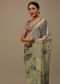Pista Green Embroidered Muslin Saree With Floral Print And Scallop Borders