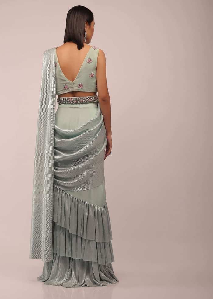 Pista Green Ready Pleated Saree With Shimmer Crepe Frill Layers And Pink Stone Studded Velvet Blouse