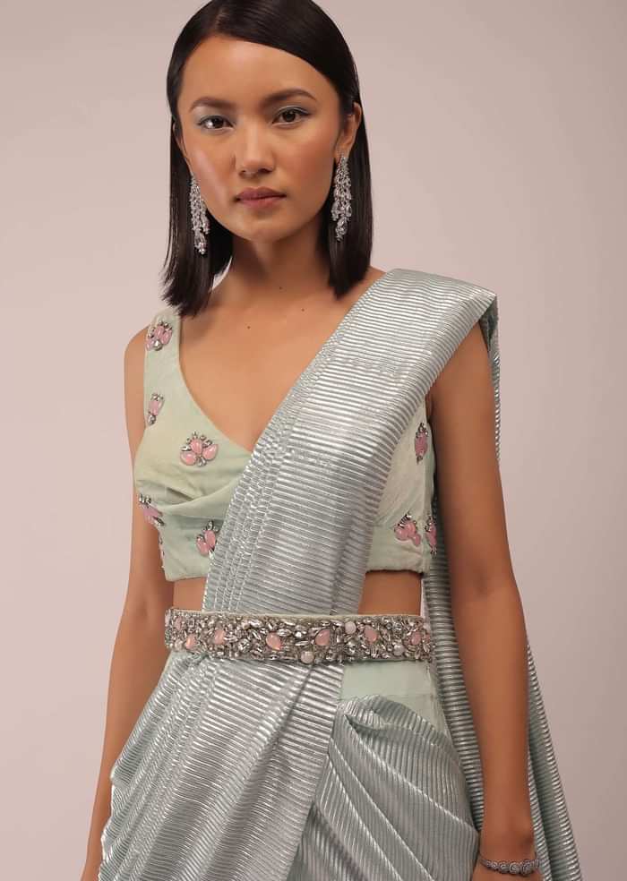 Pista Green Ready Pleated Saree With Shimmer Crepe Frill Layers And Pink Stone Studded Velvet Blouse