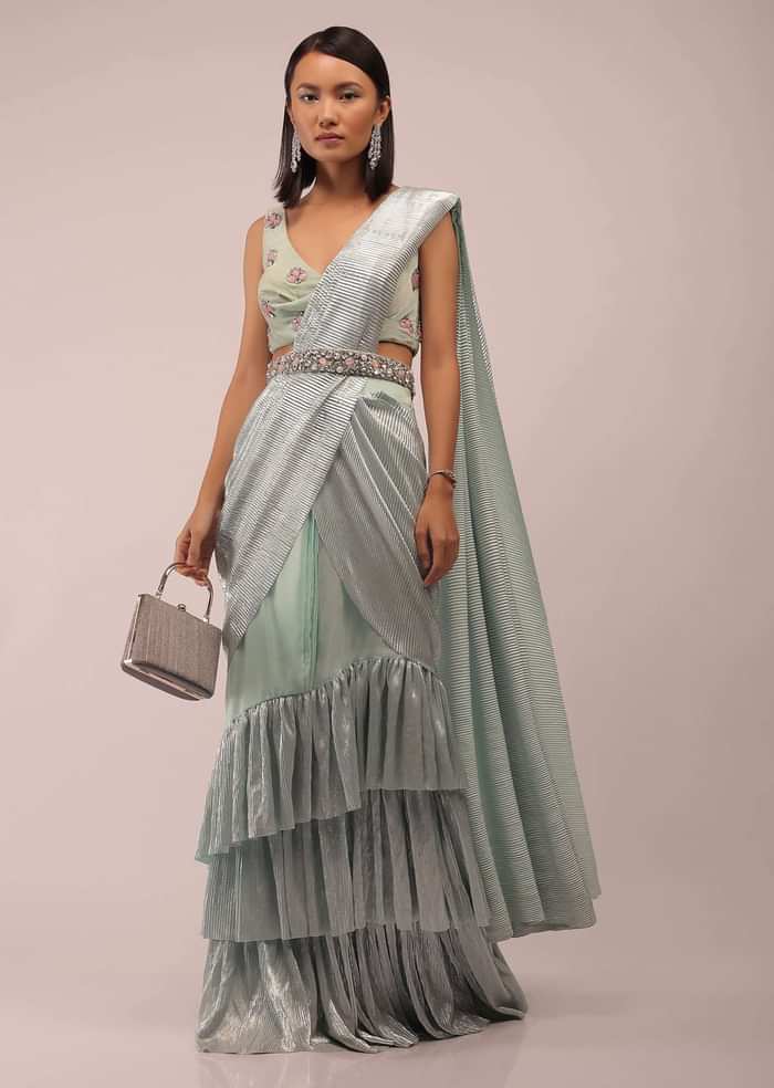Pista Green Ready Pleated Saree With Shimmer Crepe Frill Layers And Pink Stone Studded Velvet Blouse
