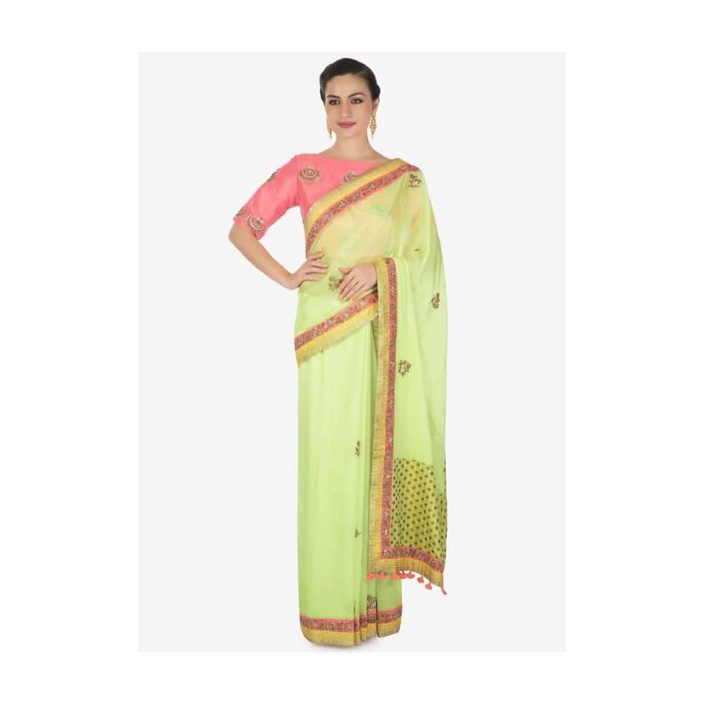 Pista green saree adorn in zardosi butti and foil printed border only on Kalki