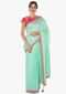Pista green saree in cotton silk with rani pink blouse adorn in cutdana embroidery work only on Kalki