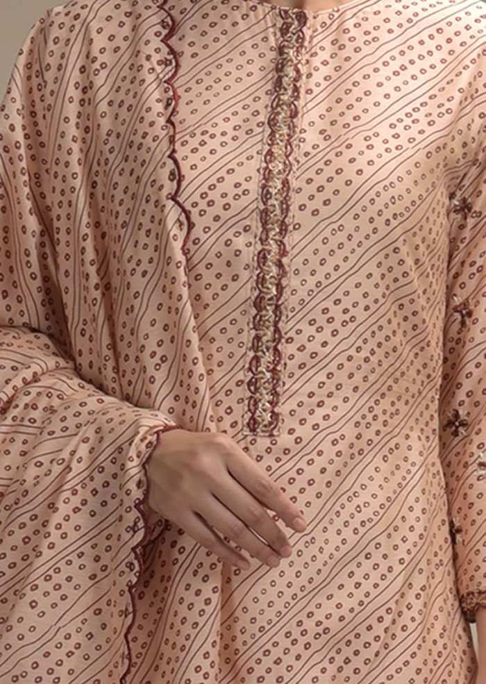 Powder Peach Straight Cut Suit In Cotton With Maroon Bandhani Print And Sequin Accents
