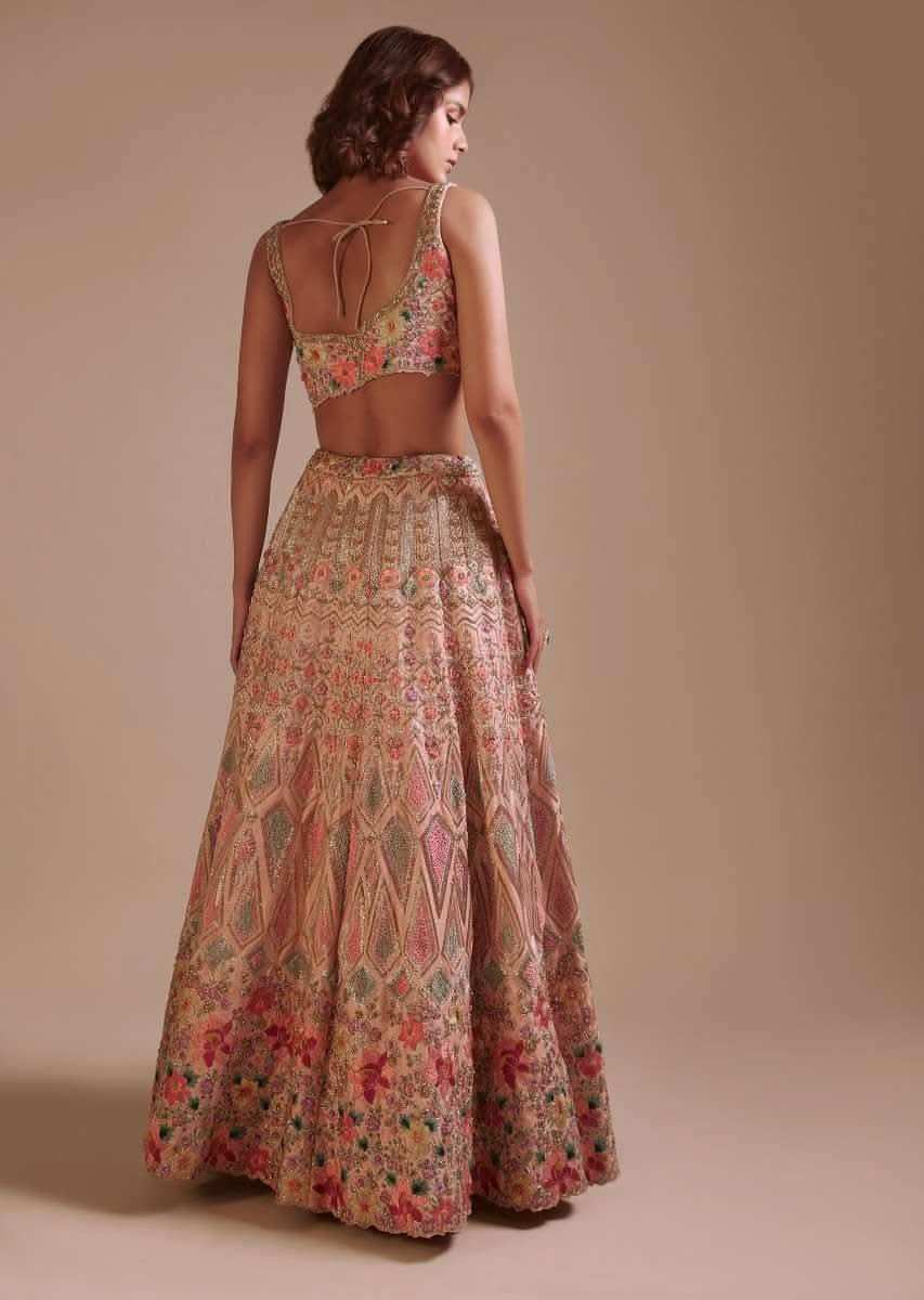 Powder Pink Lehenga Choli In Raw Silk With Colorful Resham And Sequins Embroidered Geometric And Floral Motifs