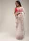 Powder White Saree In Organza With Multi Colored Sequins And Pita Zari Embroidered Floral Motifs On The Border