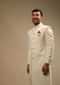 Pristine White Sherwani Set In Silk With Self Thread Embroidered Moroccan Jaal And Contrasting Pink Pocket Square