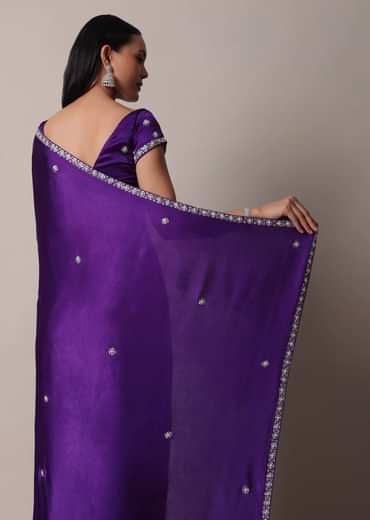 Purple Satin Chinon Saree With Stone Embellishments And Unstitched Blouse Piece