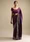 Raisin Purple Saree In Satin With Two Toned Kundan Embellished Border And Ready Stitched Blouse
