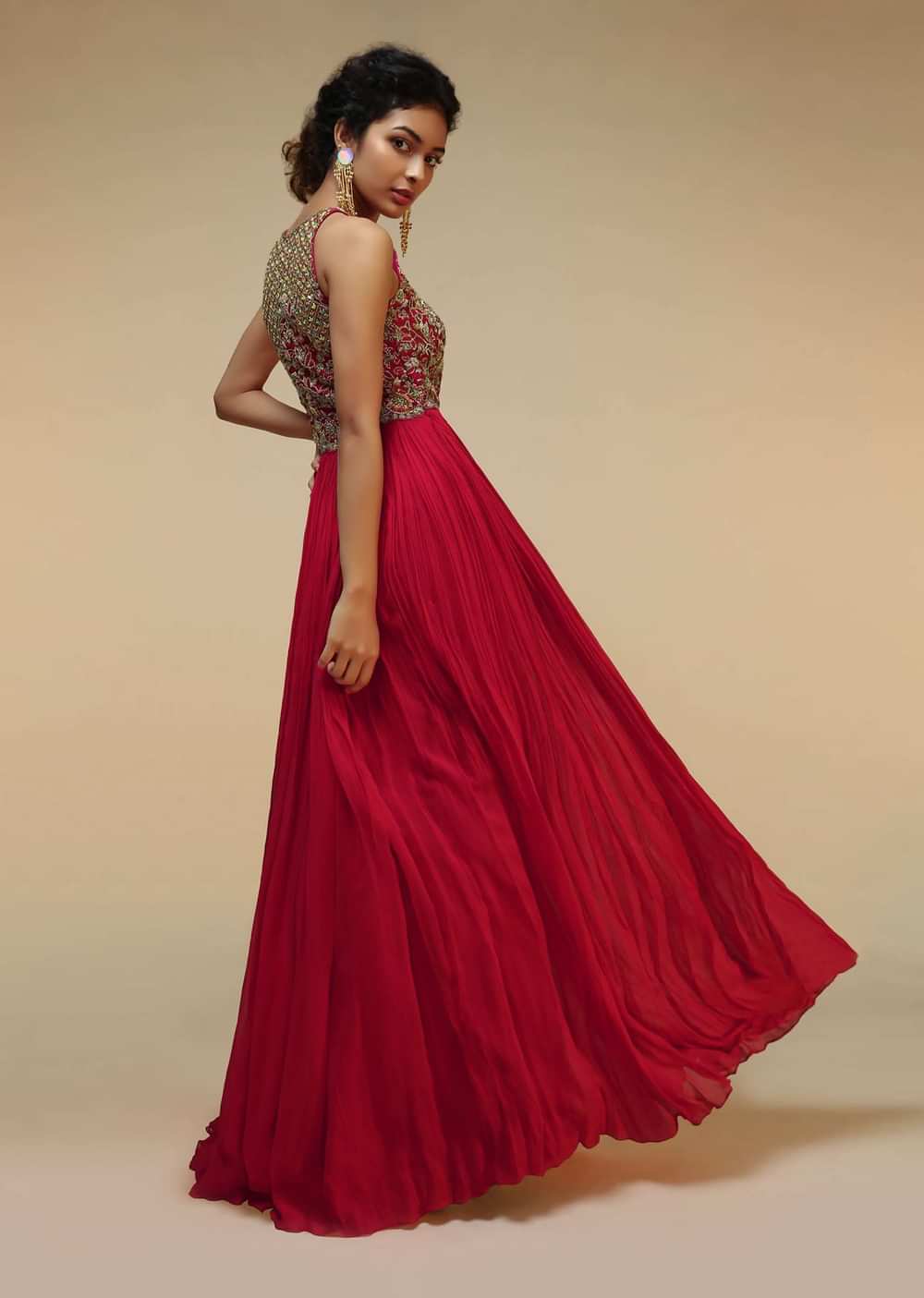 Rani Pink Anarkali Suit With Halter Neckline And Adorned In Multicolored Hand Embroidered Floral Design On The Bodice