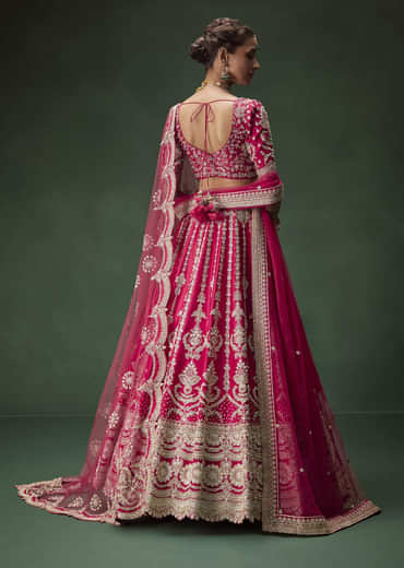 Rani Pink Bridal Lehenga With Embroidered Blouse And Heavily Worked Dupattas