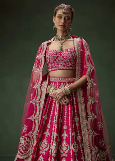 Rani Pink Bridal Lehenga With Embroidered Blouse And Heavily Worked Dupattas