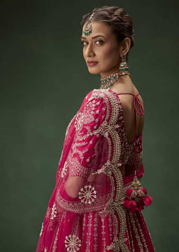 Rani Pink Bridal Lehenga With Embroidered Blouse And Heavily Worked Dupattas