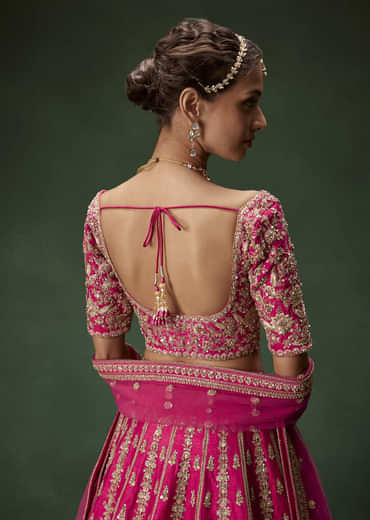 Rani Pink Bridal Lehenga With Gold Zari And Rich Embroidery
