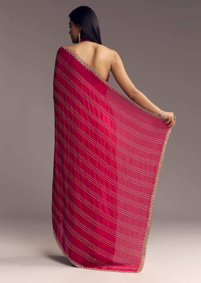 Rani Pink Embroidered Chinon Saree With Cut Dana