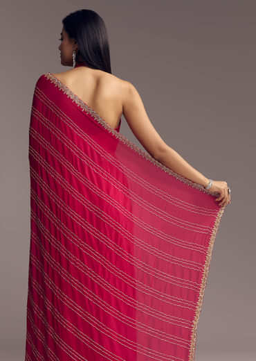 Rani Pink Embroidered Chinon Saree With Cut Dana
