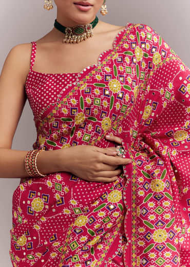 Rani Pink Satin Saree With Handwoven Ikat Print And Mirror Work Rani Pink Satin Saree With Handwoven Ikat Print And Mirror Work