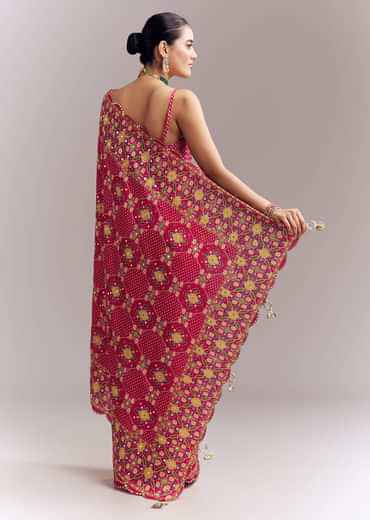 Rani Pink Satin Saree With Handwoven Ikat Print And Mirror Work Rani Pink Satin Saree With Handwoven Ikat Print And Mirror Work