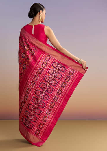 Rani Pink Silk Single Ikkat Handwoven Patola Saree With Geometric Motifs Rani Pink Silk Single Ikkat Handwoven Patola Saree With Geometric Motifs