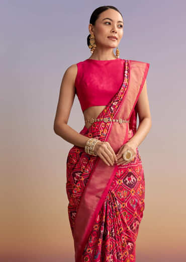 Rani Pink Silk Single Ikkat Handwoven Patola Saree With Geometric Motifs Rani Pink Silk Single Ikkat Handwoven Patola Saree With Geometric Motifs