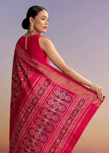 Rani Pink Silk Single Ikkat Handwoven Patola Saree With Geometric Motifs Rani Pink Silk Single Ikkat Handwoven Patola Saree With Geometric Motifs