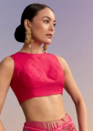 Rani Pink Silk Single Ikkat Handwoven Patola Saree With Geometric Motifs Rani Pink Silk Single Ikkat Handwoven Patola Saree With Geometric Motifs