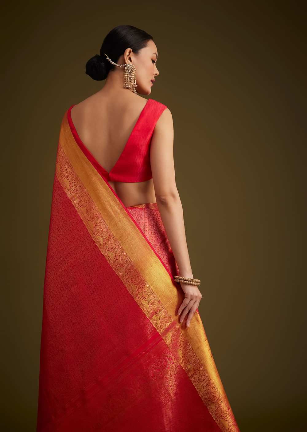Rani Pink Kanjivaram Silk Saree With Golden Zari Detailing