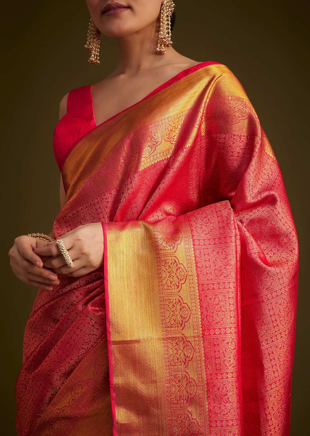 Rani Pink Kanjivaram Silk Saree With Golden Zari Detailing