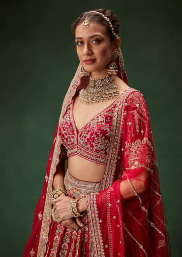 Red Bridal Lehenga With Intricate Hand Embroidery And Double Dupatta Drape