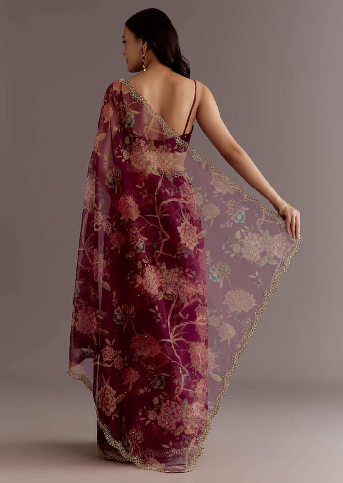 Wine Organza Saree With Floral Print And Hand Embellished Border