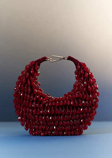 Red Potli With Beaded Embellishments Red Potli With Beaded Embellishments