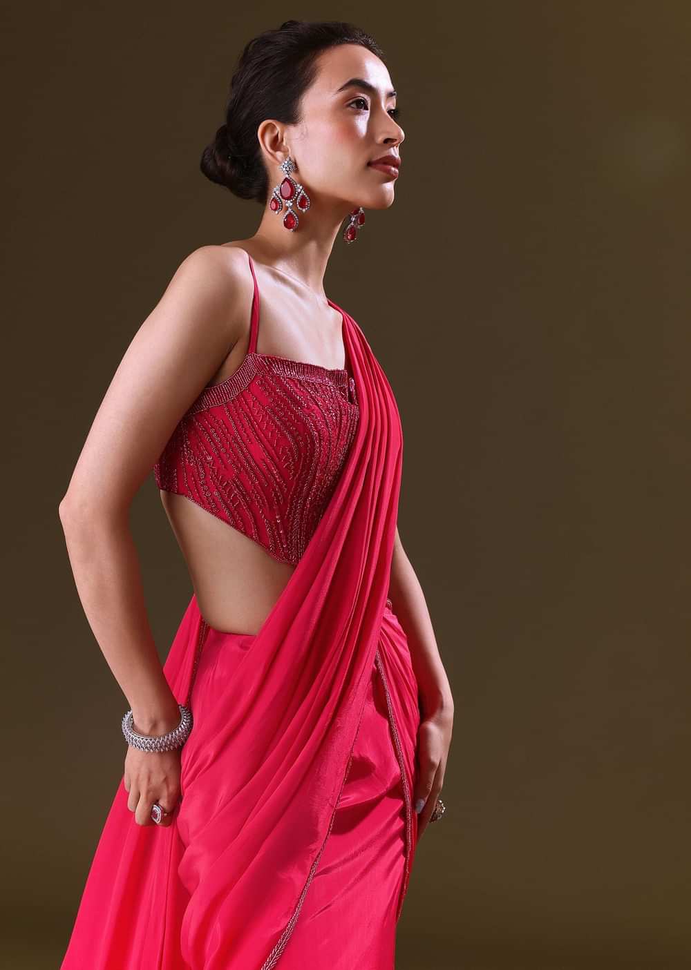 Reddish Pink Pre Stitched Draped Saree With Corset Fit Embroidered Blouse