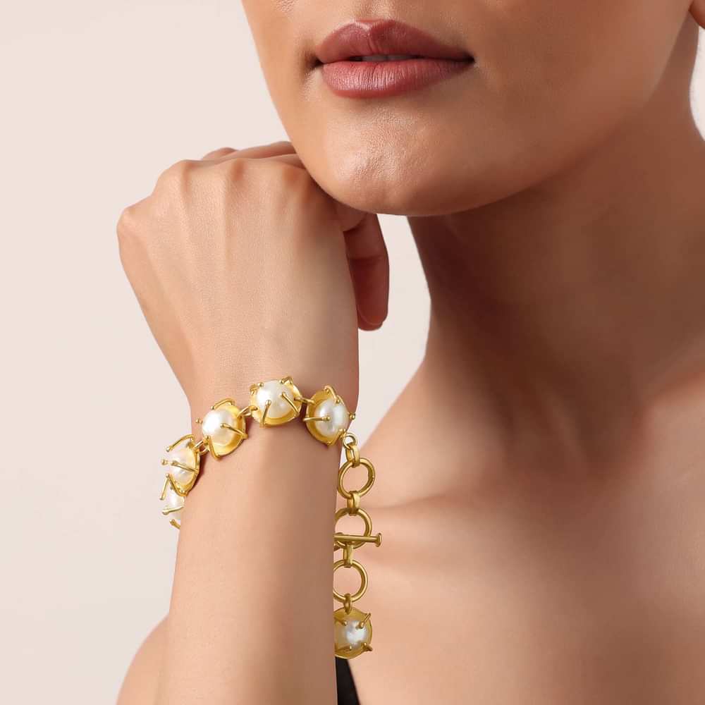 Rose Gold Finish Bracelet With Mother Of Pearls