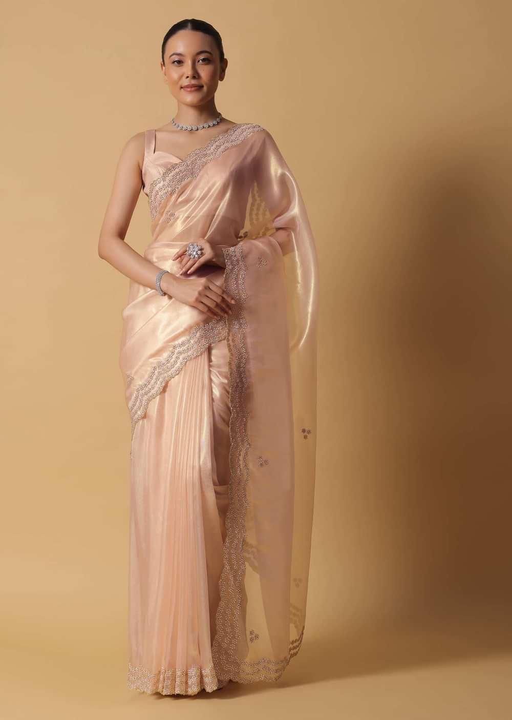 Rose Gold Toned Foil Saree In Tissue With Cut Dana Embroidered Borders