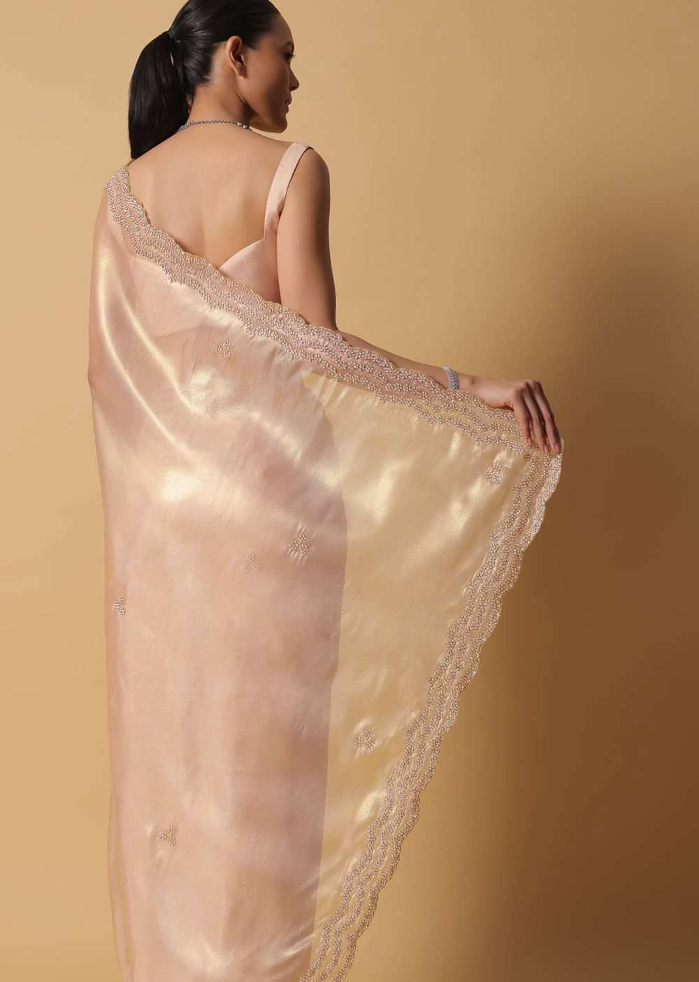 Rose Gold Toned Foil Saree In Tissue With Cut Dana Embroidered Borders
