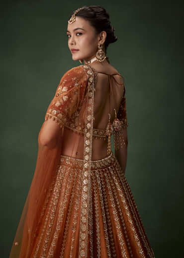 Rust Bridal Raw Silk Embellished Lehenga Set with Two Dupattas