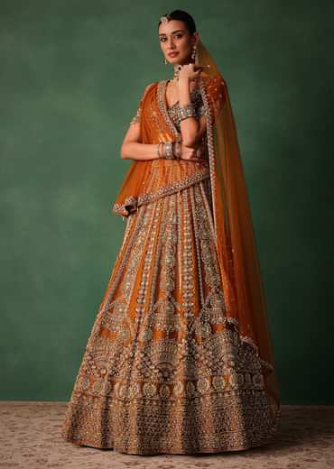 Rust Embroidered Bridal Lehenga With Deep Neckline Blouse And Dupatta