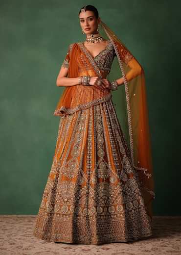 Rust Embroidered Bridal Lehenga With Deep Neckline Blouse And Dupatta