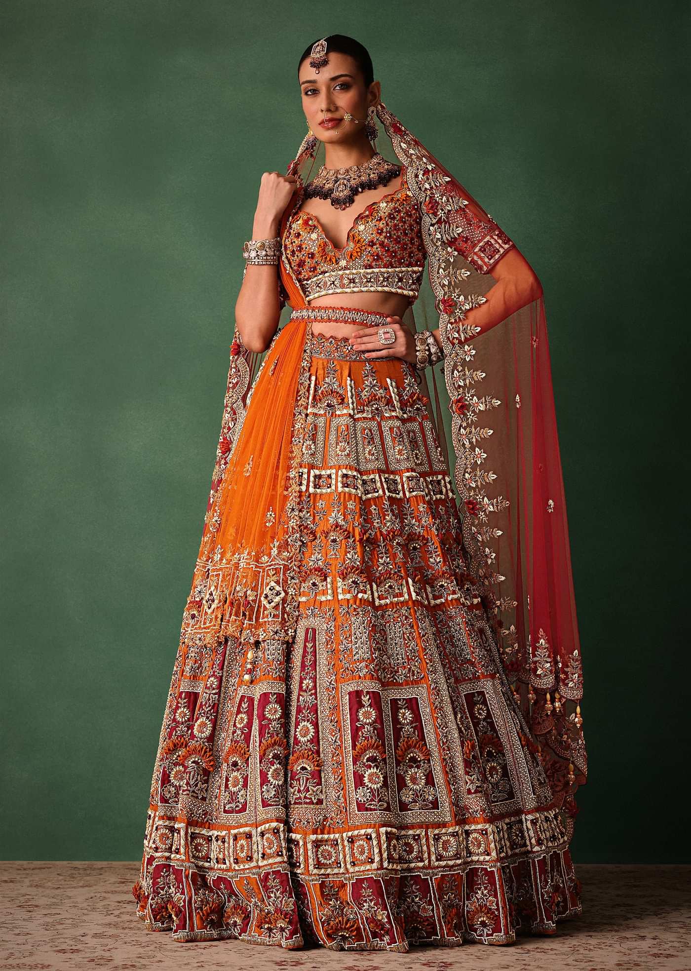 Rust Red Hand Work Bridal Lehenga With Deep Neckline Blouse And Dupatta