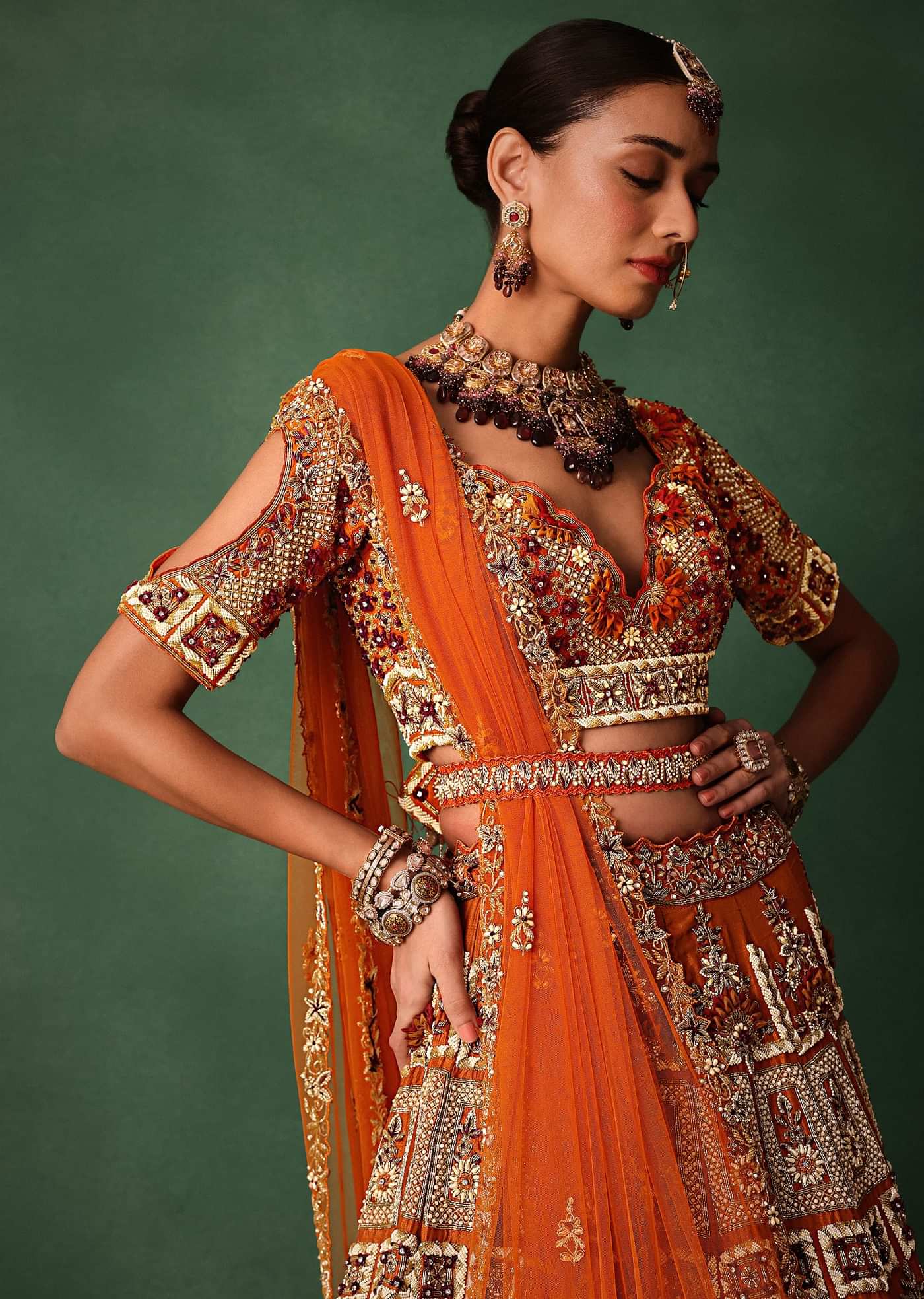 Rust Red Hand Work Bridal Lehenga With Deep Neckline Blouse And Dupatta