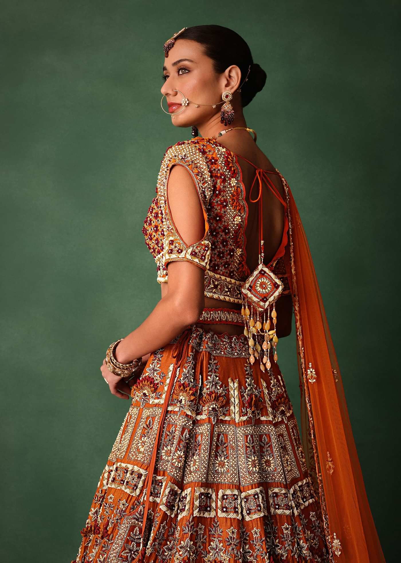 Rust Red Hand Work Bridal Lehenga With Deep Neckline Blouse And Dupatta