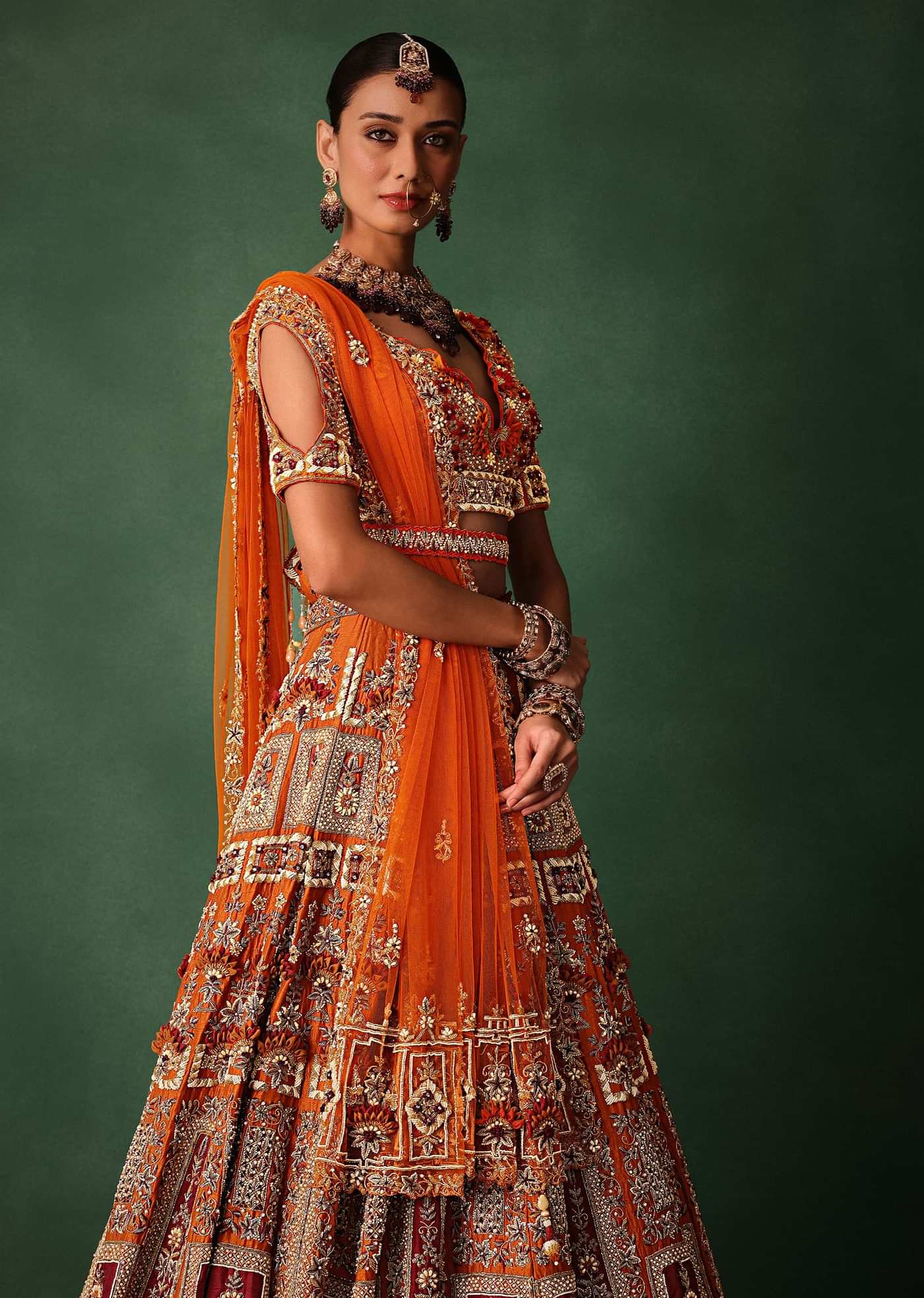 Rust Red Hand Work Bridal Lehenga With Deep Neckline Blouse And Dupatta