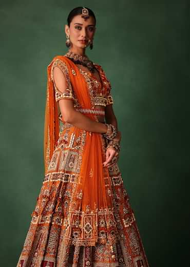 Rust Red Hand Work Bridal Lehenga With Deep Neckline Blouse And Dupatta