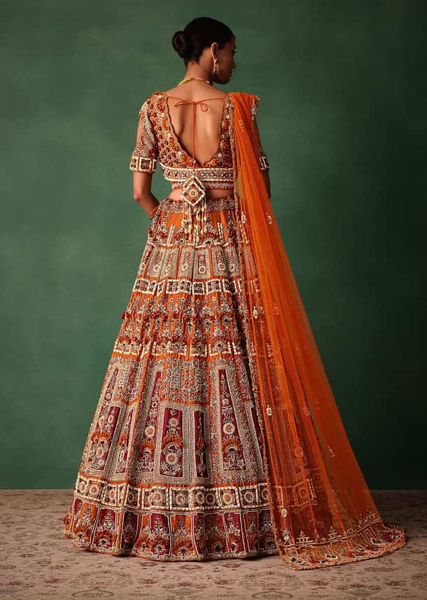 Rust Red Hand Work Bridal Lehenga With Deep Neckline Blouse And Dupatta